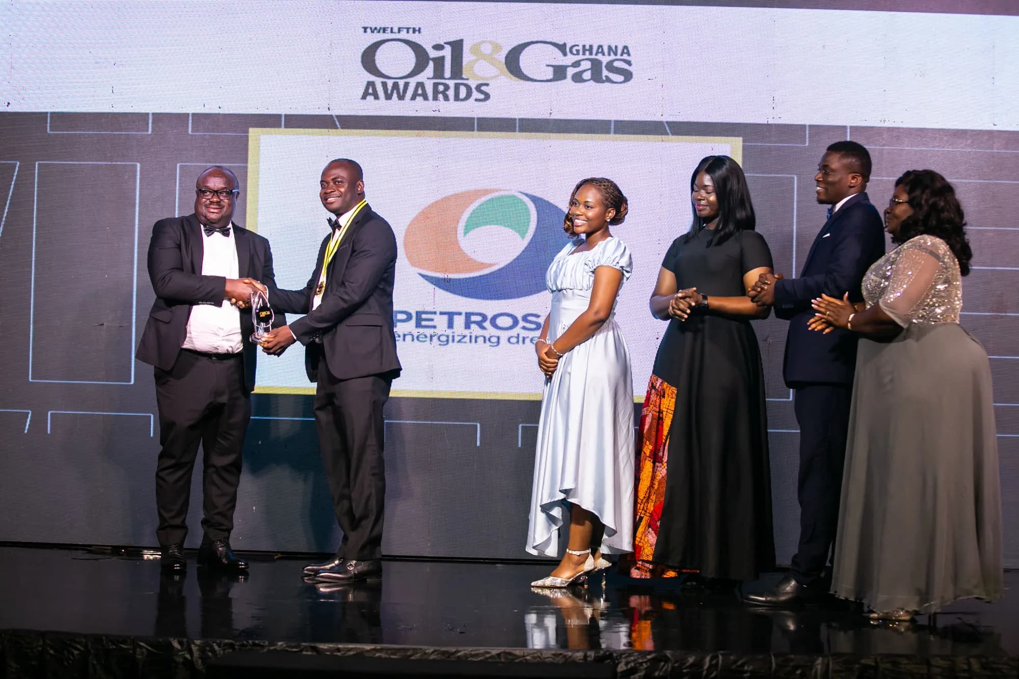 PETROSOL receiving an award on stage at the Twelfth Ghana Oil and Gas Awards